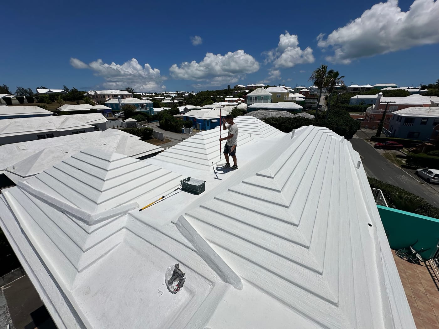 Bermuda step roof freshly coated in white